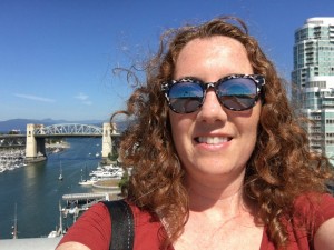 On the Granville Island Bridge, with the Burrard Street Bridge in the background.